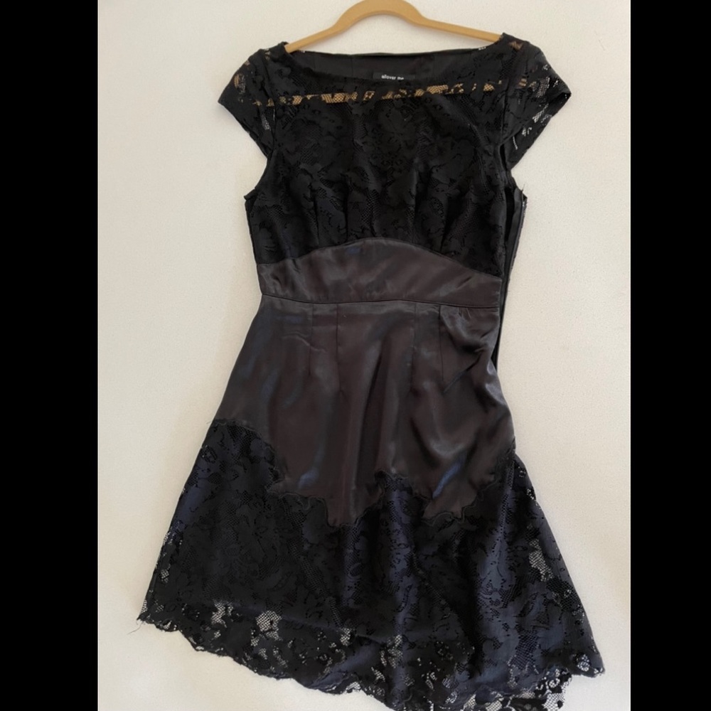 Black silky dress with lace detail. Elegant & edgy